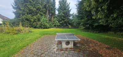 Die Bäume verdecken die beiden Liegenschaften 9 & 11